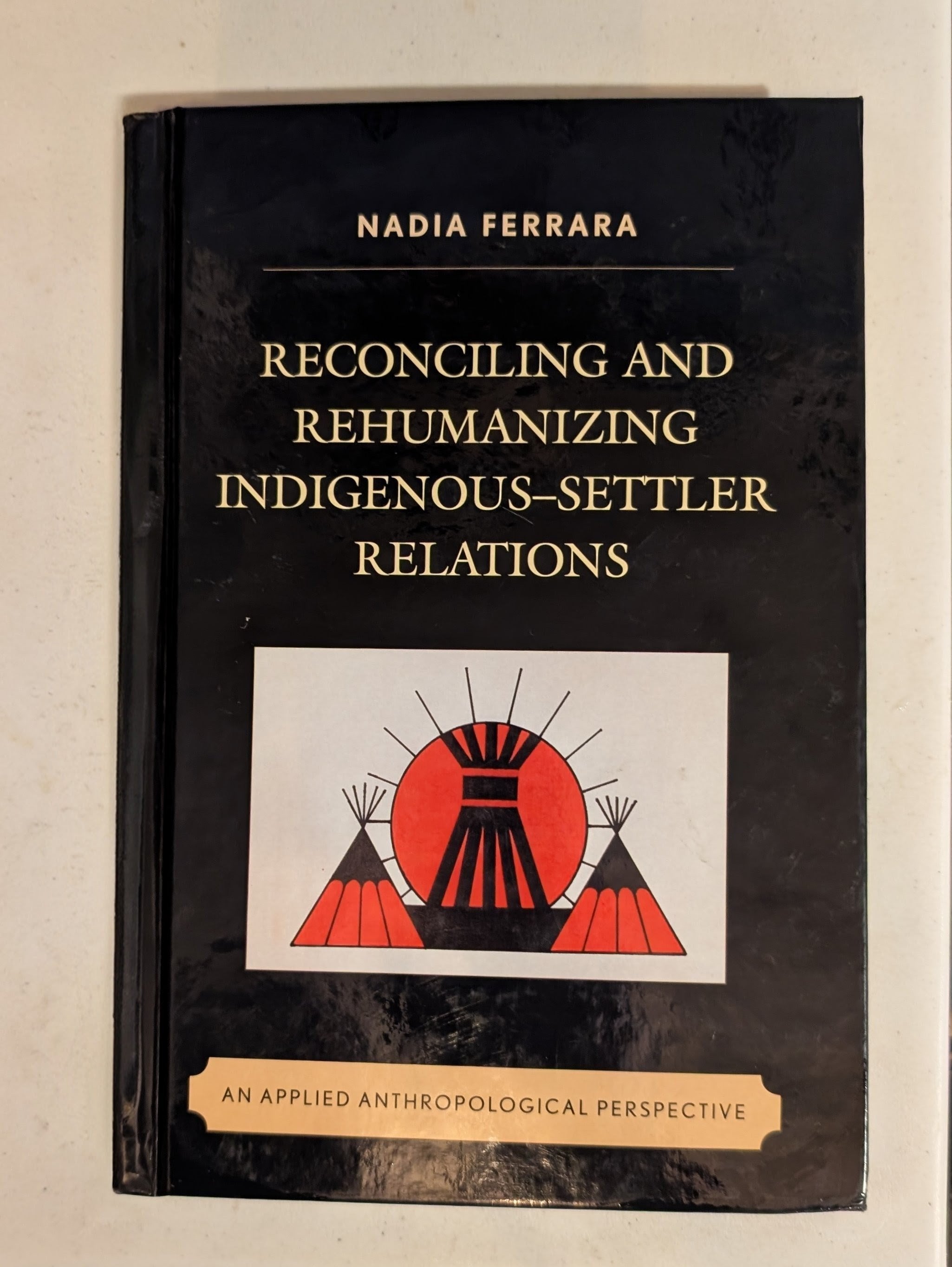 Reconciling and Rehumanizing Indigenous–Settler Relations: An Applied Anthropological Perspective